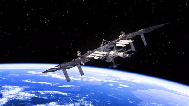 Stazione Spaziale Internazionale che vola sopra la terra e ruota i suoi pannelli solari . — Video Stock