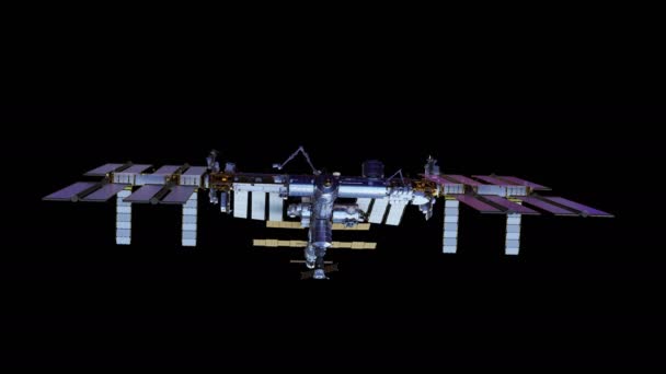 4K. Estación Espacial Internacional gira paneles solares. Con Alpha mate . — Vídeos de Stock