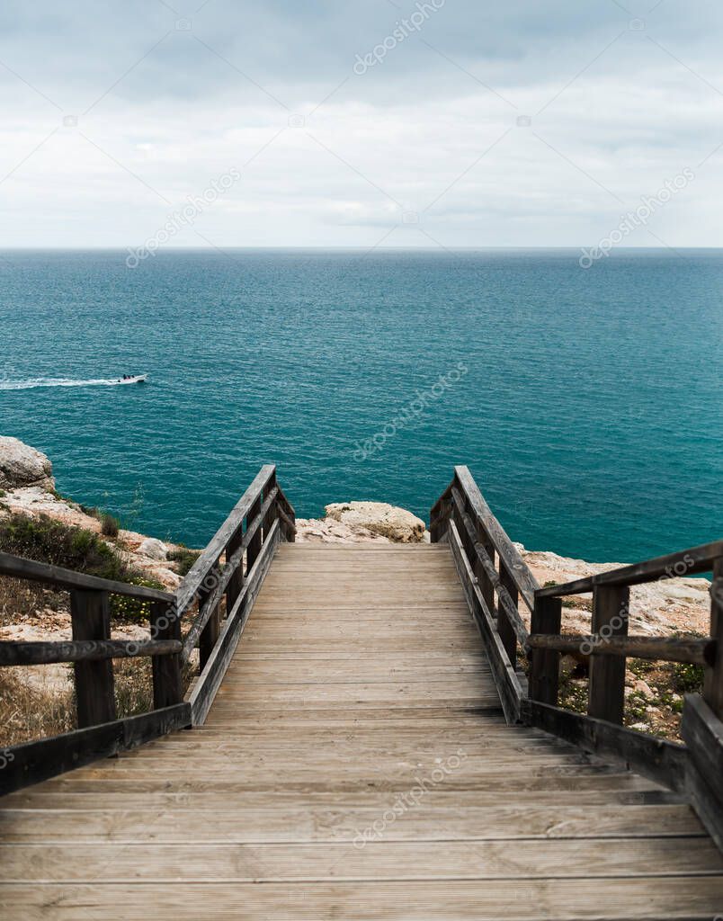 Wild rough coast. Beautiful view from the seaside cliff.