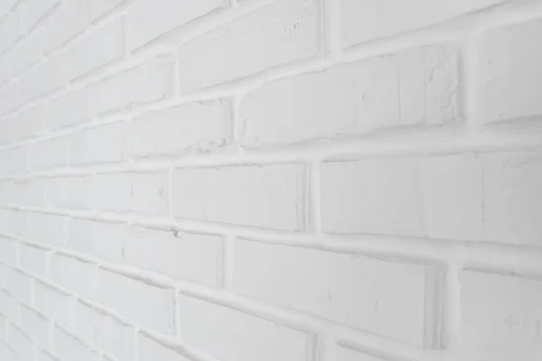 different view of the white brick wall,stylish white wall,white brick wall after repair