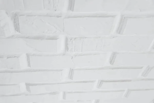 different view of the white brick wall,stylish white wall,white brick wall after repair