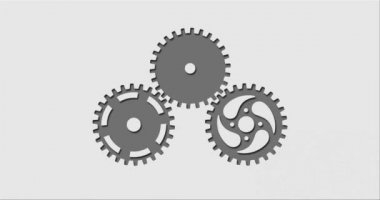 Açık gri arkaplanda kesilen üç dönen dişli