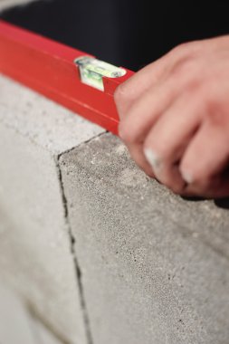 İnşaat işçisi, çimento veya tuğla döşeme ve duvar oluşturma mason. Ayrıntı düzeyi aracı