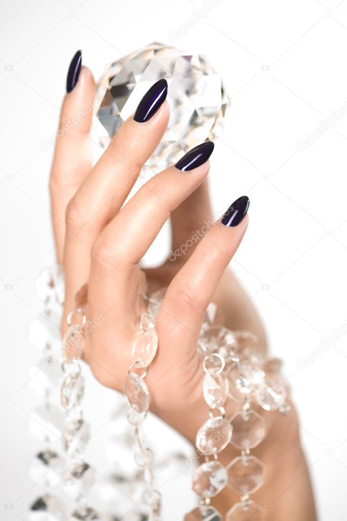 Beautiful woman hands with big diamond