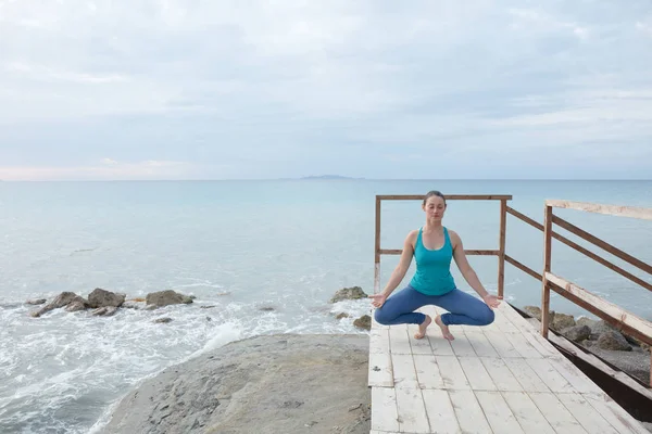 Young yoga woman in yoga pattern exercise for healthy life. Woma