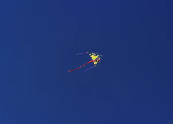 Colorful kite flying in the sky — Stock Photo, Image