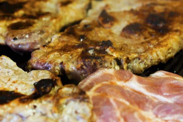 Baking fresh meat on grill — Stock Photo, Image