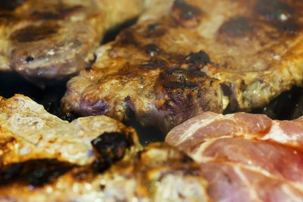 Baking fresh meat on grill — Stock Photo, Image