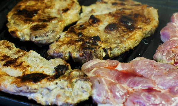 Baking fresh meat on grill — Stock Photo, Image