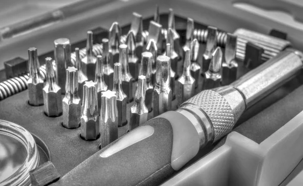 Mechanical bit tool set in black and white — Stock Photo, Image