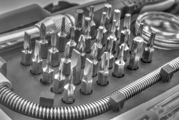 Ferramenta de bits mecânica em preto e branco — Fotografia de Stock