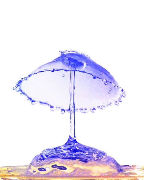 Kolorowy płyn rozchlapać izolowana na białym tle — Zdjęcie stockowe