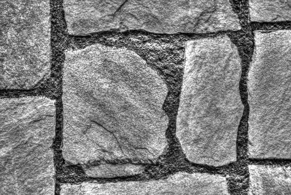 Stylish stone wall background in black and white — Stock Photo, Image