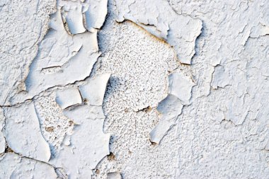 Duvar kağıdı soymak. Eski duvar dokusu, pul desenli torba.