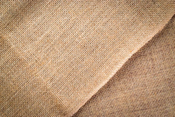 Fondo de lino. Lona beige orgánica natural. Fondo tejido marrón. Tejido de lino Material fondo de algodón — Foto de Stock