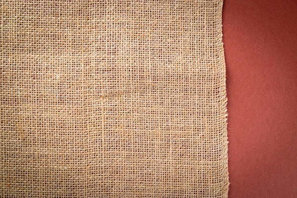 Keten desenli. Doğal organik kahverengi tuval. Bej işlemeli arka plan. Keten Malzeme Arkaplanı