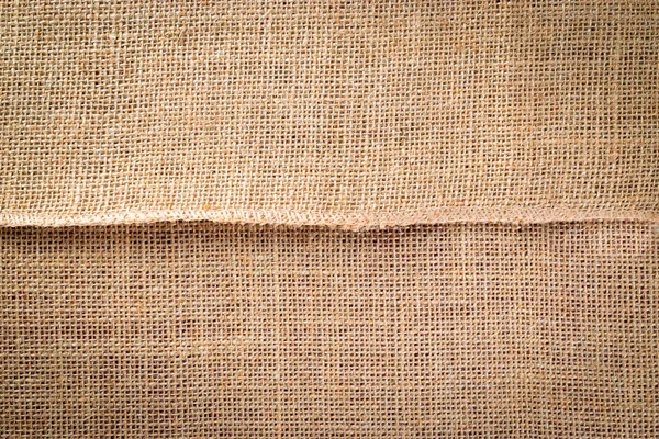 Fundo de lona. Linen Fundo bege orgânico natural. Material tecido textura marrom — Fotografia de Stock