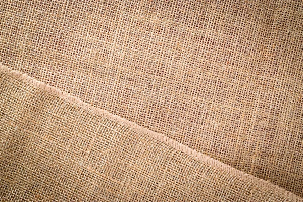 Fundo de lona. Linen Fundo bege orgânico natural. Material tecido textura marrom — Fotografia de Stock