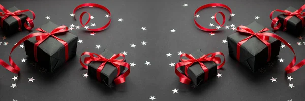 Nastro confezione regalo. Regali di Natale, decorazioni rosse su sfondo nero. Regalo di Natale. Concetto vacanza invernale. Capodanno. Noel . — Foto Stock