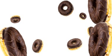 Donut cookies. Chocolate glazed sweet doughnut in motion falling on white background. Sweet icing sugar food.