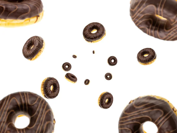 Fallende SchokoladenDonuts isoliert auf weißem Hintergrund. süße Zuckerpuderkrapfen. — Stockfoto