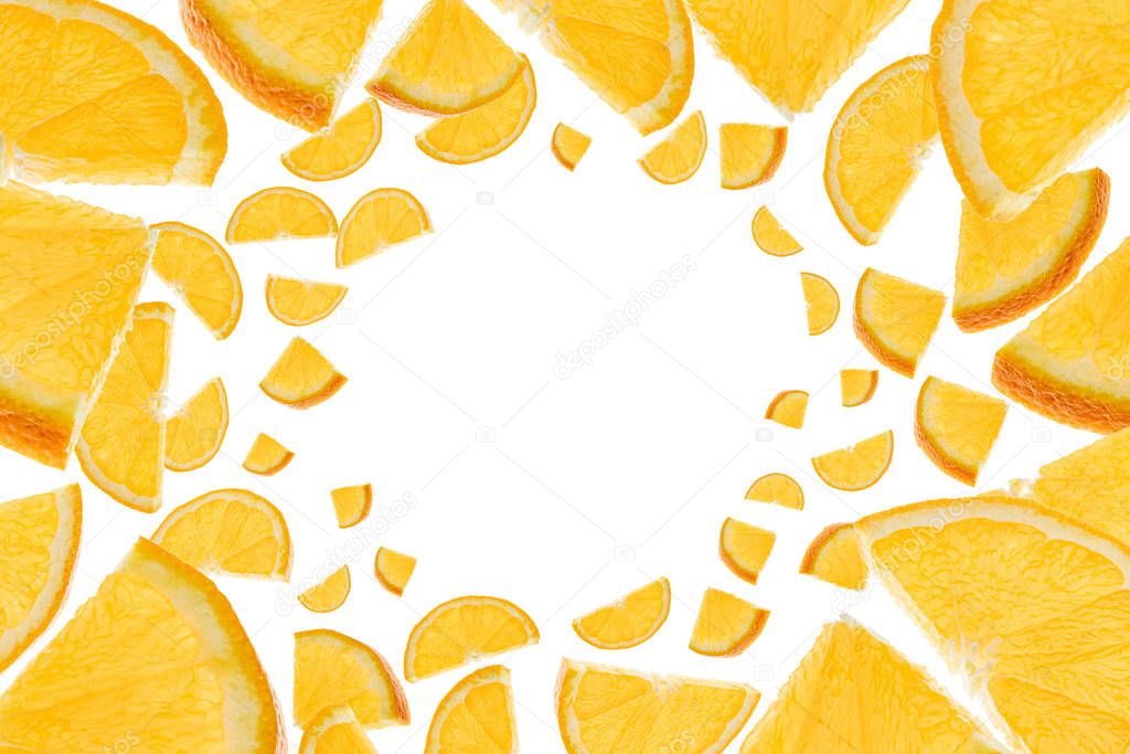 Orange fruit texture background. Citrus fruit tangerine flying on white. Fresh food concept.