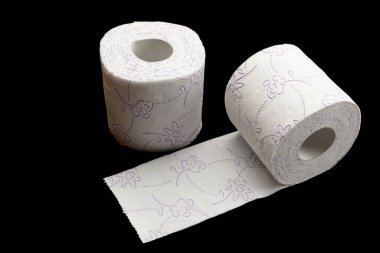 Toilet paper roll. Soft tissue isolated on black background. Cleaning concept product photograph for advertising clipart