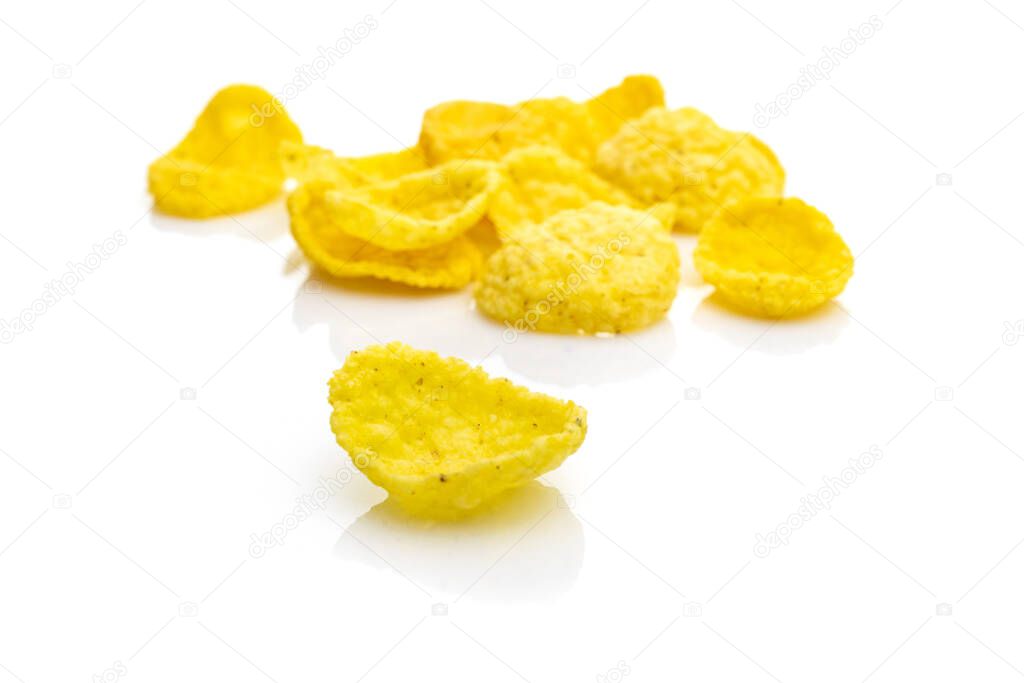 Cereals breakfast. Healthy Superfood corn flakes isolated on white background. Healthy eating, dieting and detoxication concept, space for text. Macro close-up shot.