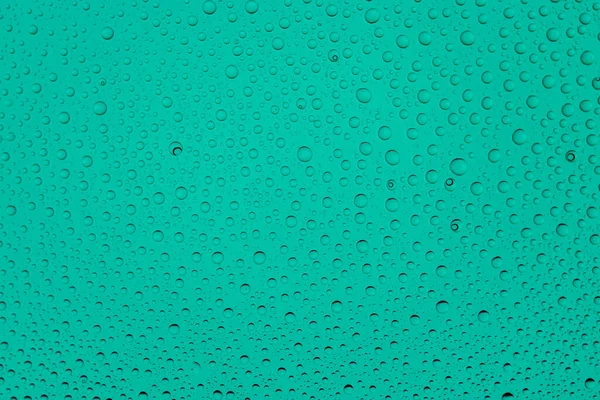 Gotas de fondo. Agua mojada sobre vidrio. Textura del patrón de lluvia . —  Fotos de Stock