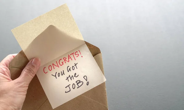 Congrats you got the job message in an envelope. Work or employm