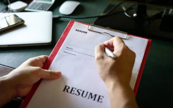 Closeup View Hiring Manager Reviewing Resume His Office Desk — Stock Photo, Image