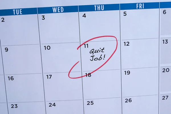 Quit job, words in calendar. Circled in red. Employment or careers concept.