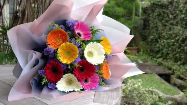 Hand Bouquet Colorful Daisies Table — Stock Video