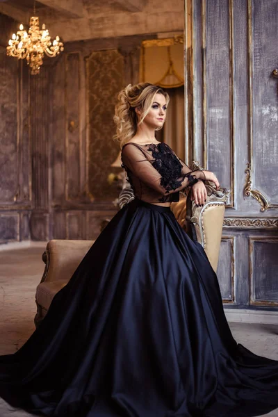 Young Woman in Black Dress with Makeup, Hairstyle and Crown, Wearing  Accessories, Poses Near To a Stone Cross. Stock Photo - Image of artistic,  lady: 209369754