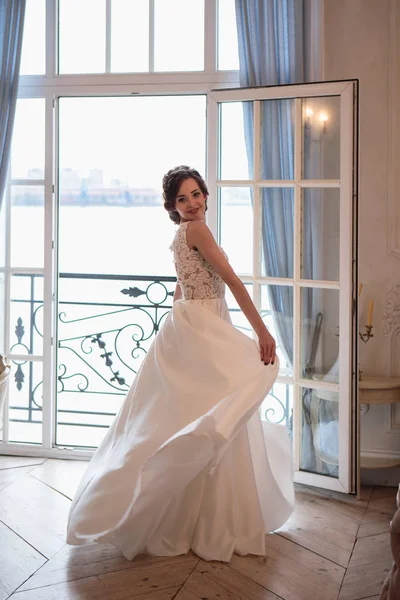 Beautiful bride in luxury dress. Beautiful young woman in wedding photosession