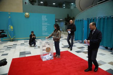 local people visiting presidential elections on June 9, 2019 in Astana, Kazakhstan clipart