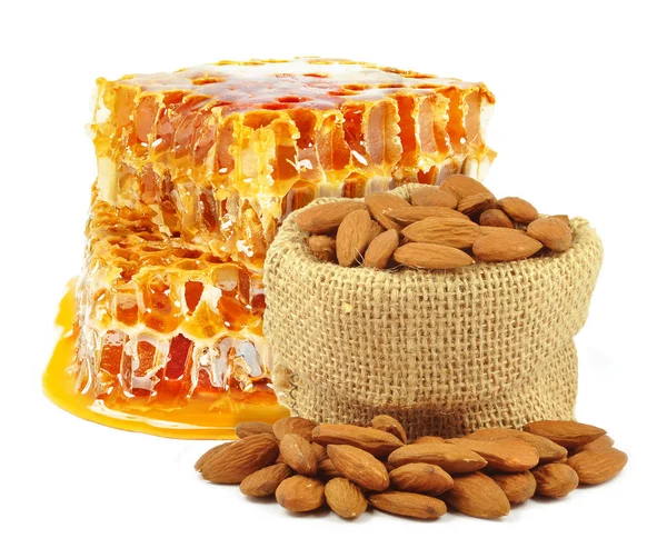 Mandel nötter och honung — Stockfoto
