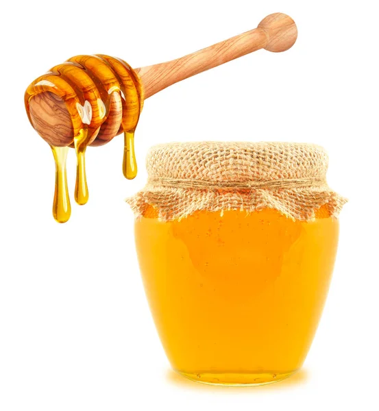 Honing Een Kruik Dipper Druipend Een Witte Achtergrond — Stockfoto
