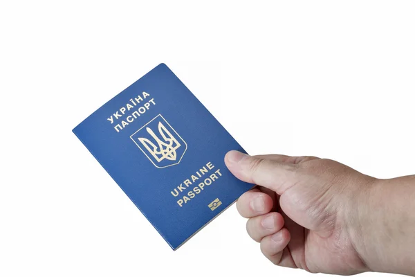 Руки, що тримає біометричний паспорт громадянина України ізольовані на білому тлі — стокове фото