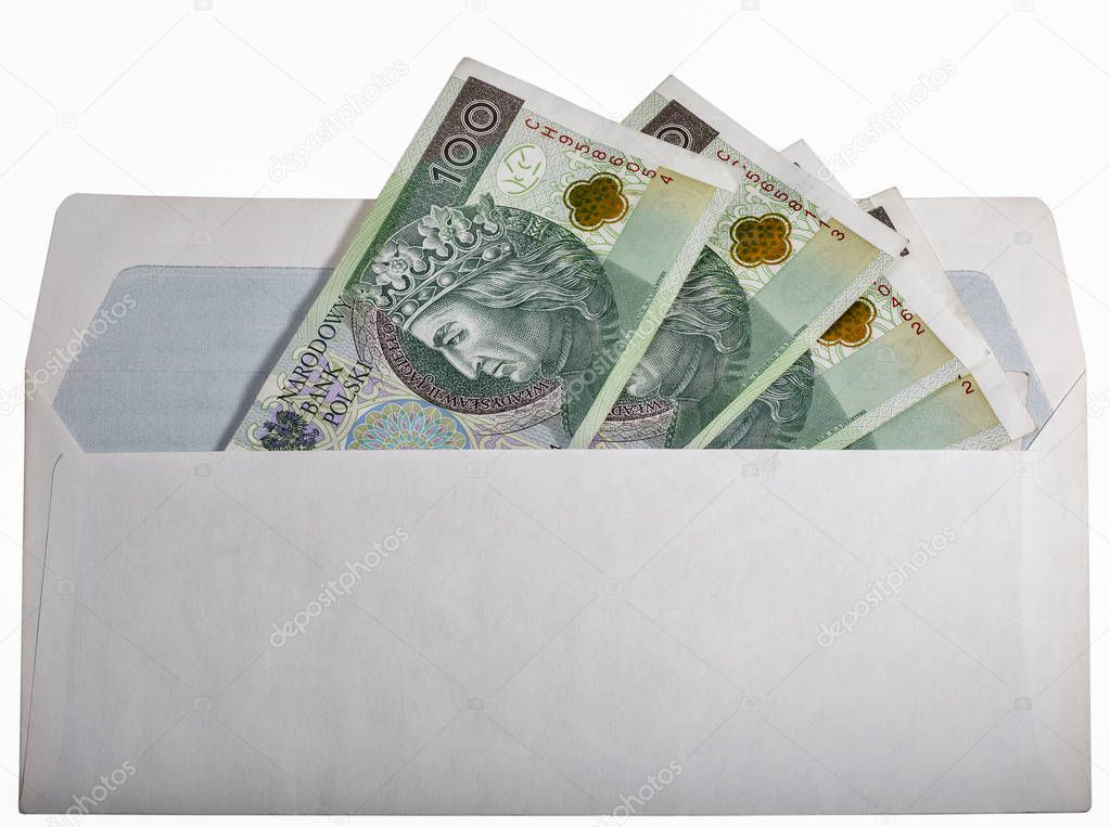 Polish zloty bills in paper envelop isolated on white