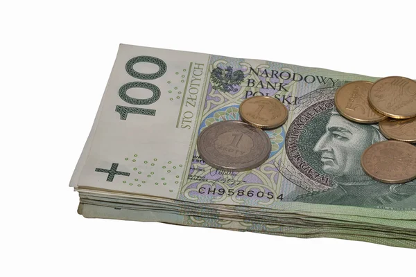 Stos polskie banknoty i monety na białym tle — Zdjęcie stockowe