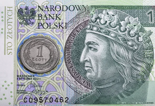 Polish one hundred zloty bill and coin macro — Stock Photo, Image
