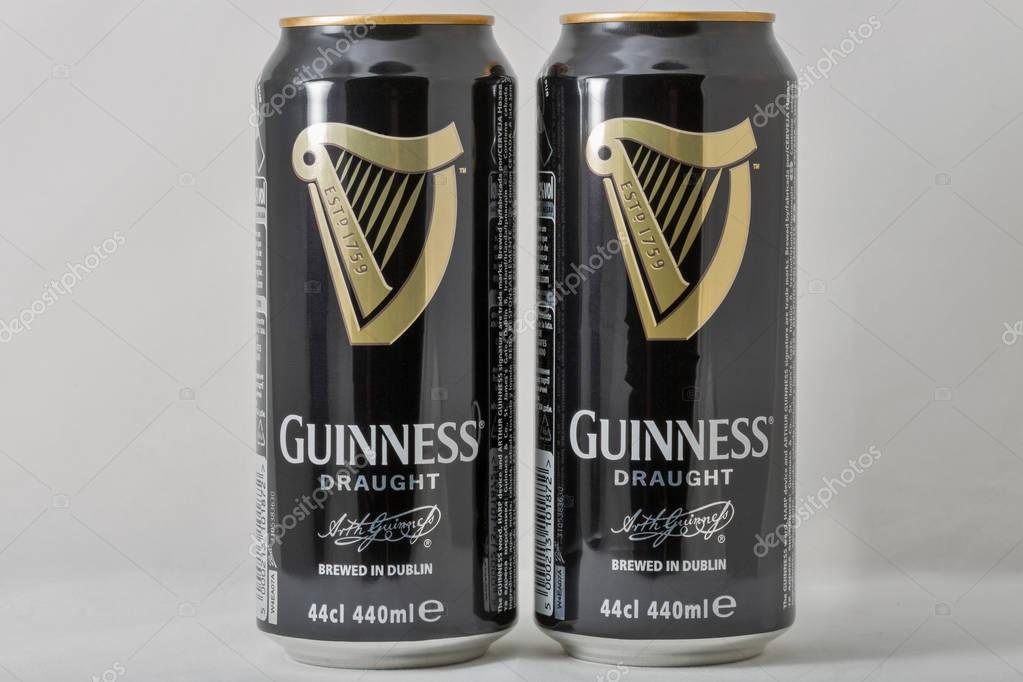 KIEV, UKRAINE - APRIL 17, 2016: Guiness draught beer cans closeup. It is one of the most successful beer brands worldwide, an Irish dry stout from the brewery of Arthur Guinness in Dublin, Ireland.