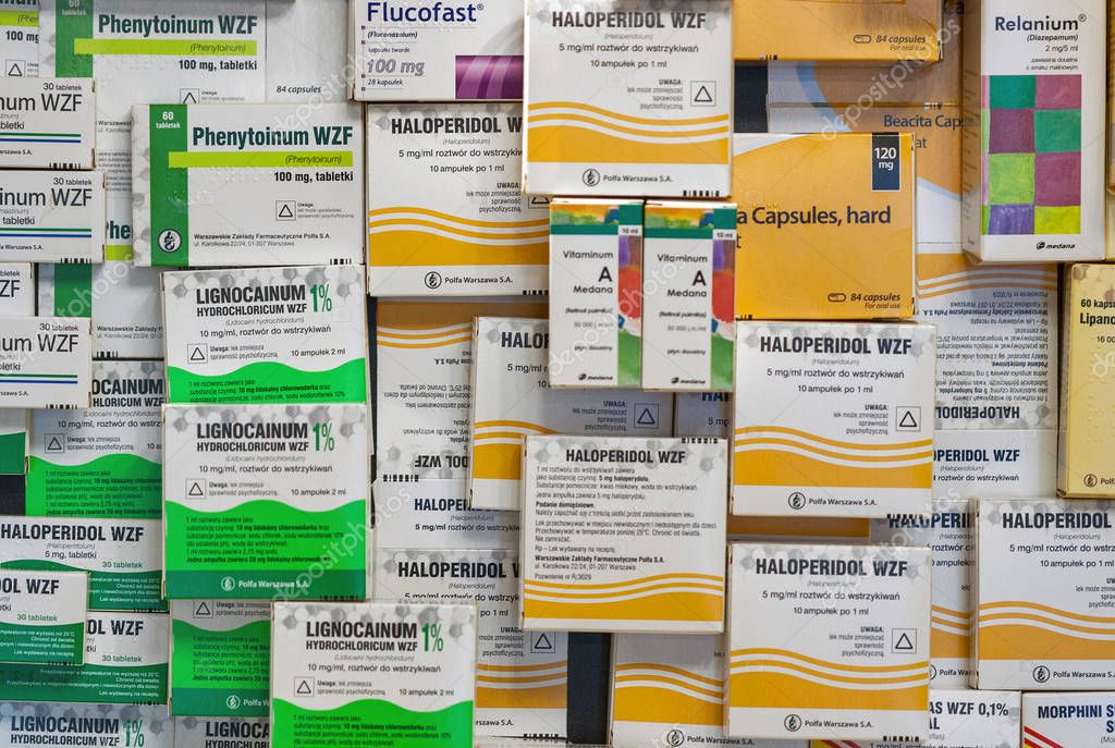 WARSAW, POLAND - MARCH 07, 2015: Boxes of different Rx and OTC drugs of Polish companies Polfa and Medana closeup. The companies deals in generic medications and medical devices.