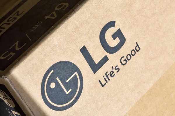 LG company logo on carton box closeup. — Stock Photo, Image