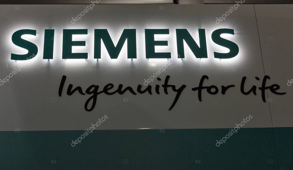 KIEV, UKRAINE - APRIL 07, 2017: Siemens booth logo closeup at 2nd International Trade Show of Electric and Hybrid Vehicles Plug-In Ukraine in KyivExpoPlaza venue.