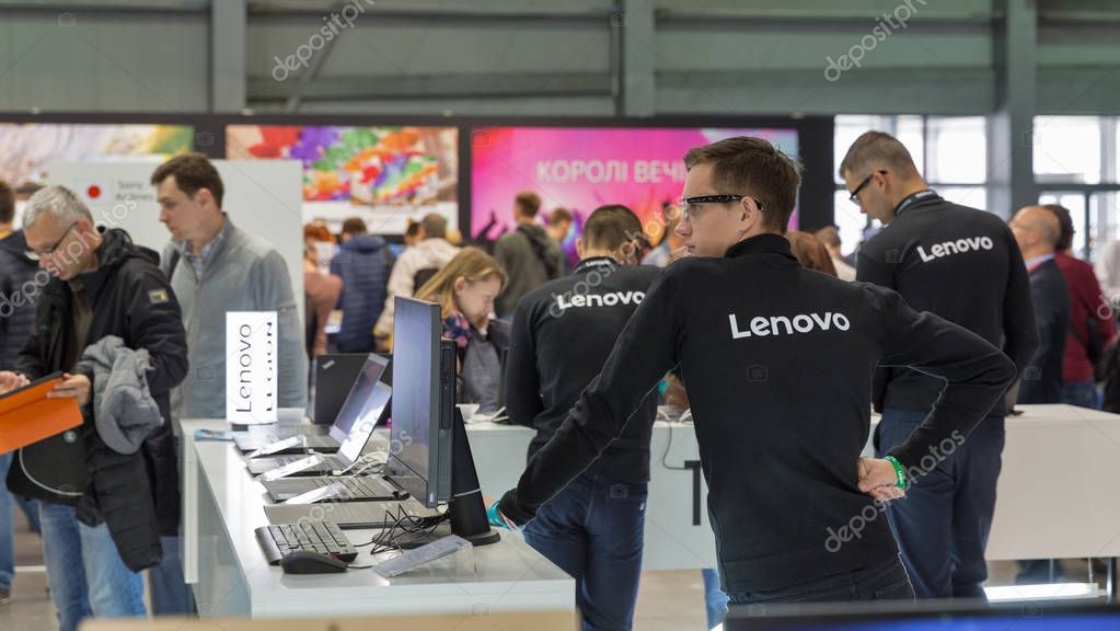 KIEV, UKRAINE - OCTOBER 07, 2017: Unrecognized people visit Lenovo, a Chinese multinational technology company booth during CEE 2017, the largest electronics trade show of Ukraine in KyivExpoPlaza EC.