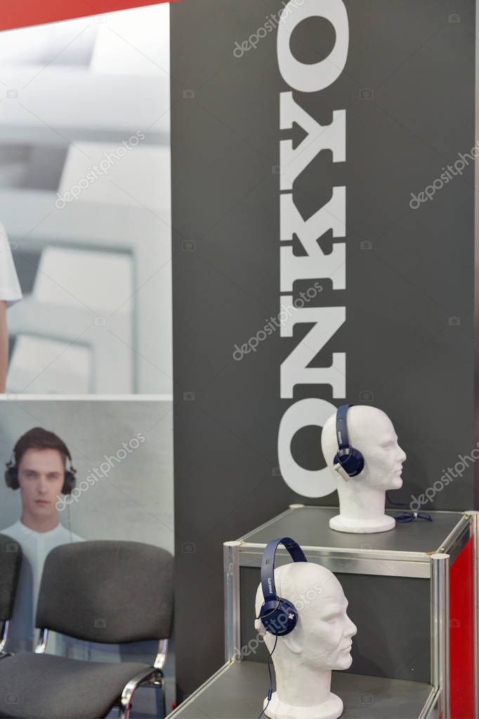 KIEV, UKRAINE - OCTOBER 07, 2017: Onkyo headphones booth, Japanese consumer electronics manufacturer, during CEE 2017, the largest electronics trade show of Ukraine in KyivExpoPlaza EC.