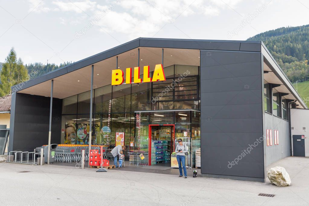 HAUS, AUSTRIA - SEPTEMBER 24, 2017: People visit Billa supermarket. Haus village is a small winter resort located in Styria, Austria.