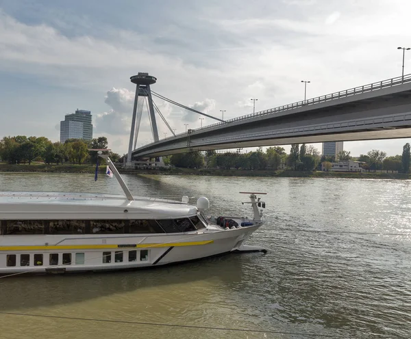 Ship moored under the UFO Bridge in Bratislava, Slovakia.
